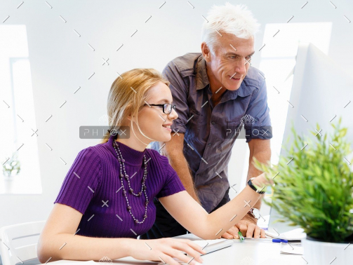 demo-attachment-117-co-workers-working-together-PRZ8DTV